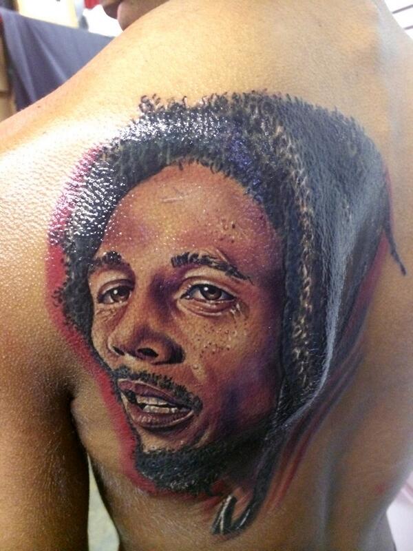 Bob Marley Tattoo On Left Back Shoulder
