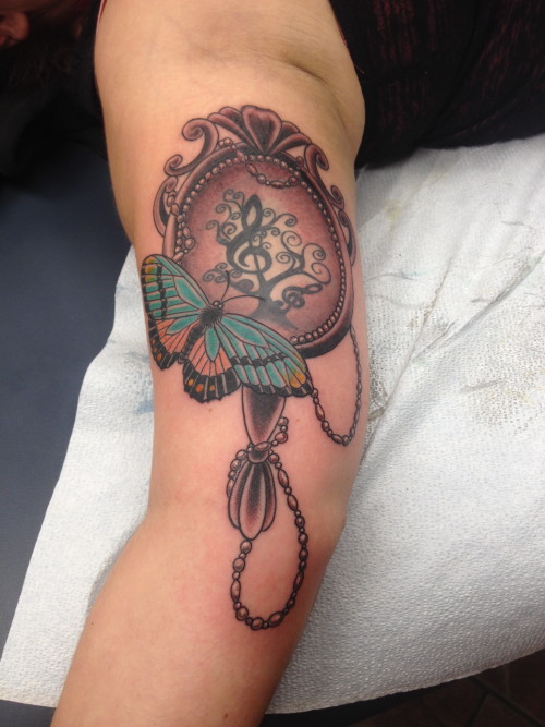 Butterfly And Hand Mirror Tattoo On Inner Bicep