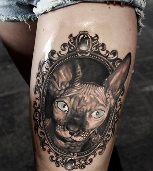 Cat In Hand Mirror Tattoo On Thigh