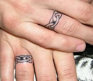 Celtic Ring Tattoo On Couple Finger