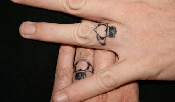 Claddagh Tattoo On Couple Finger