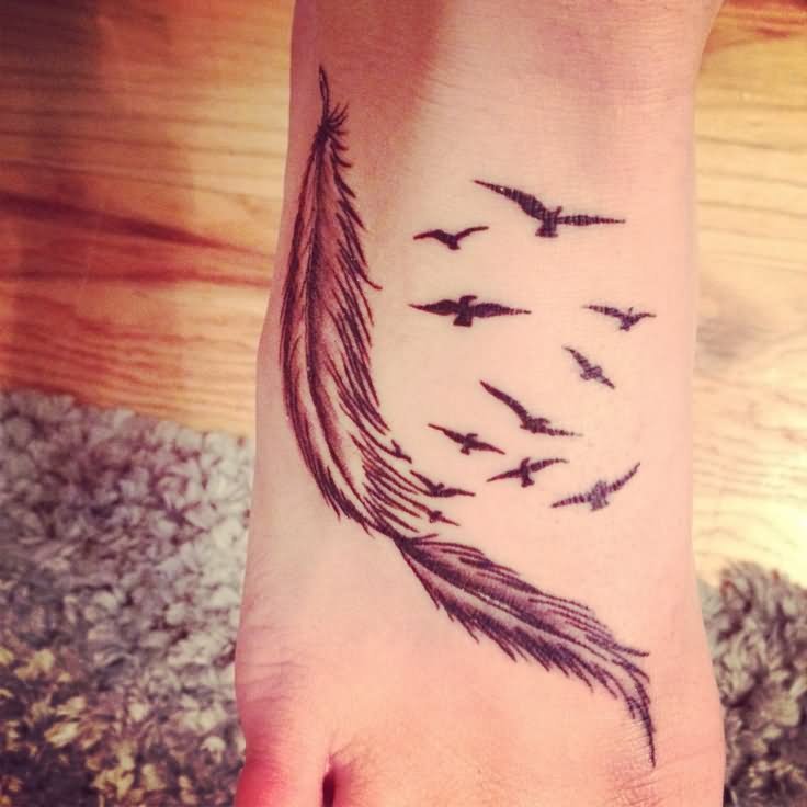 Classic Black Ink Feather Tattoo On Girl Right Foot