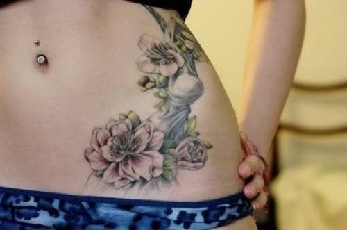 Classic Flowers Tattoo On Girl Stomach