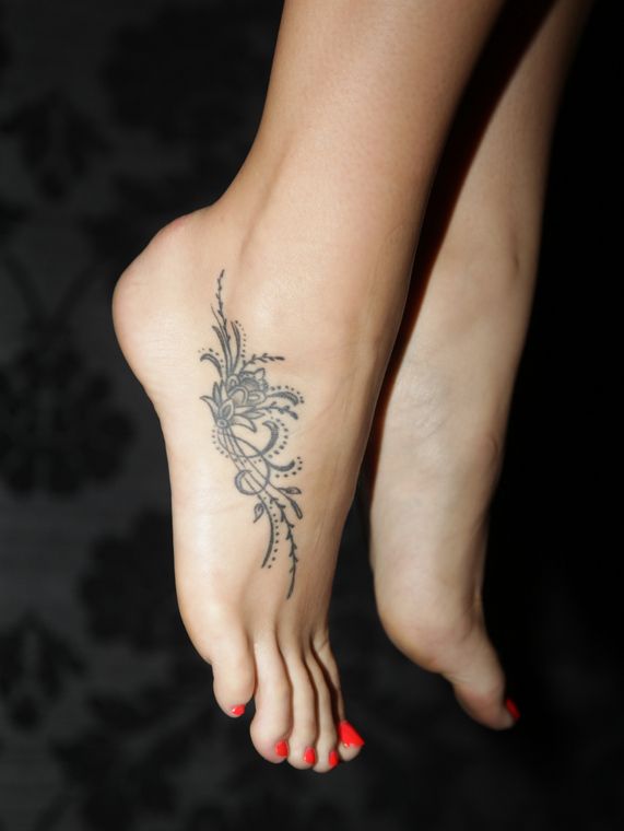 Classic Grey Ink Flower Tattoo On Girl Right Foot