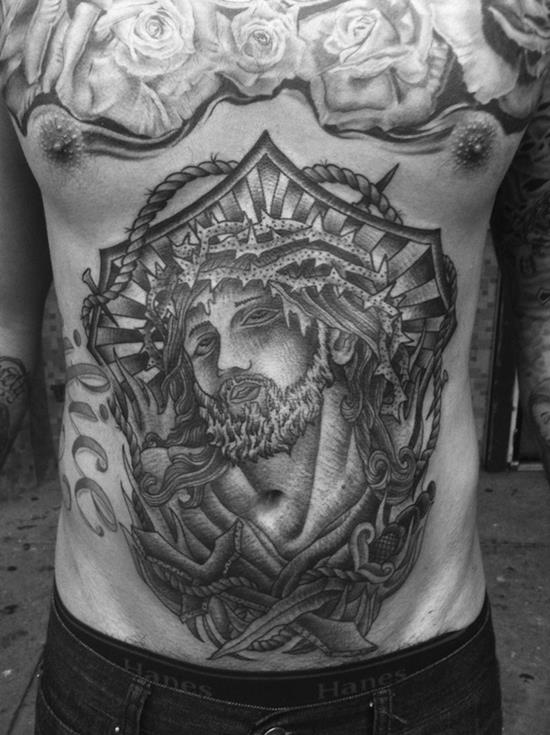 Classic Jesus Face In Frame Tattoo On Man Stomach