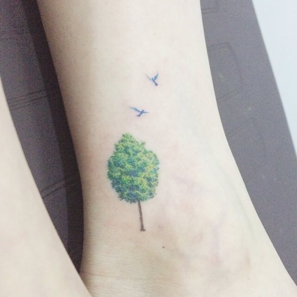 Classic Tree With Flying Birds Tattoo On Inner Ankle