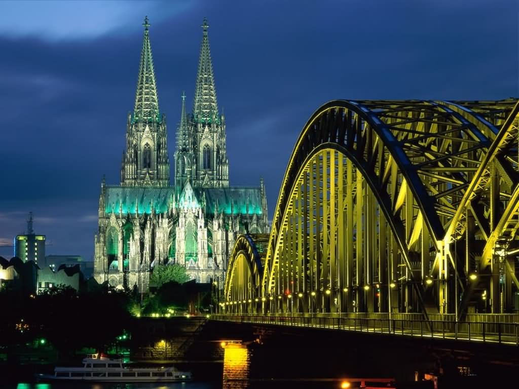 Cologne Cathedral And Bridge Lit Up At Night