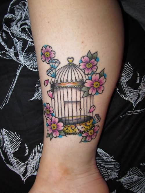 Color Flowers And Cage Tattoo On Leg