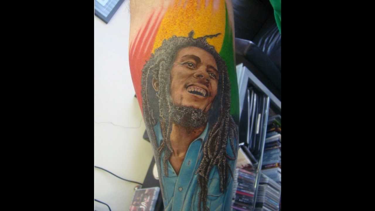 Colored Bob Marley Tattoo On Left Forearm