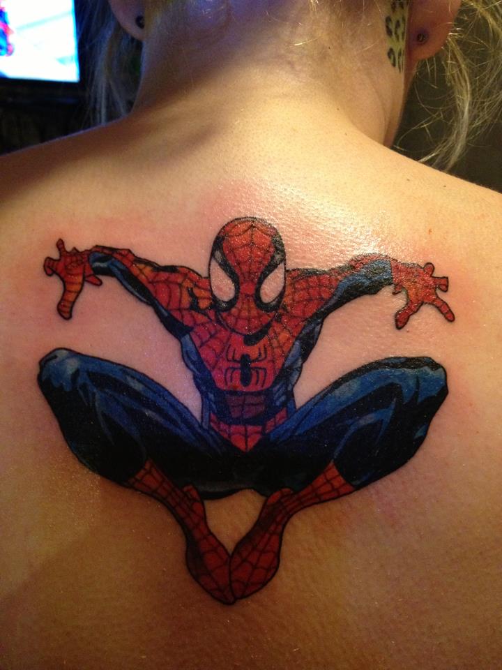 Colored Jumping Spiderman Tattoo On Girl Upper Back