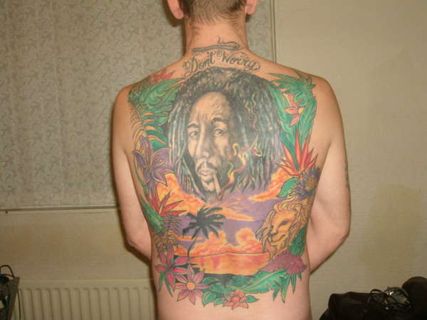 Colorful Bob Marley Tattoo On Man Full Back