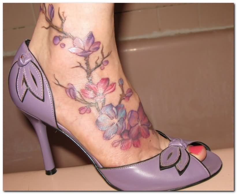 Colorful Flowers Tattoo On Girl Right Foot