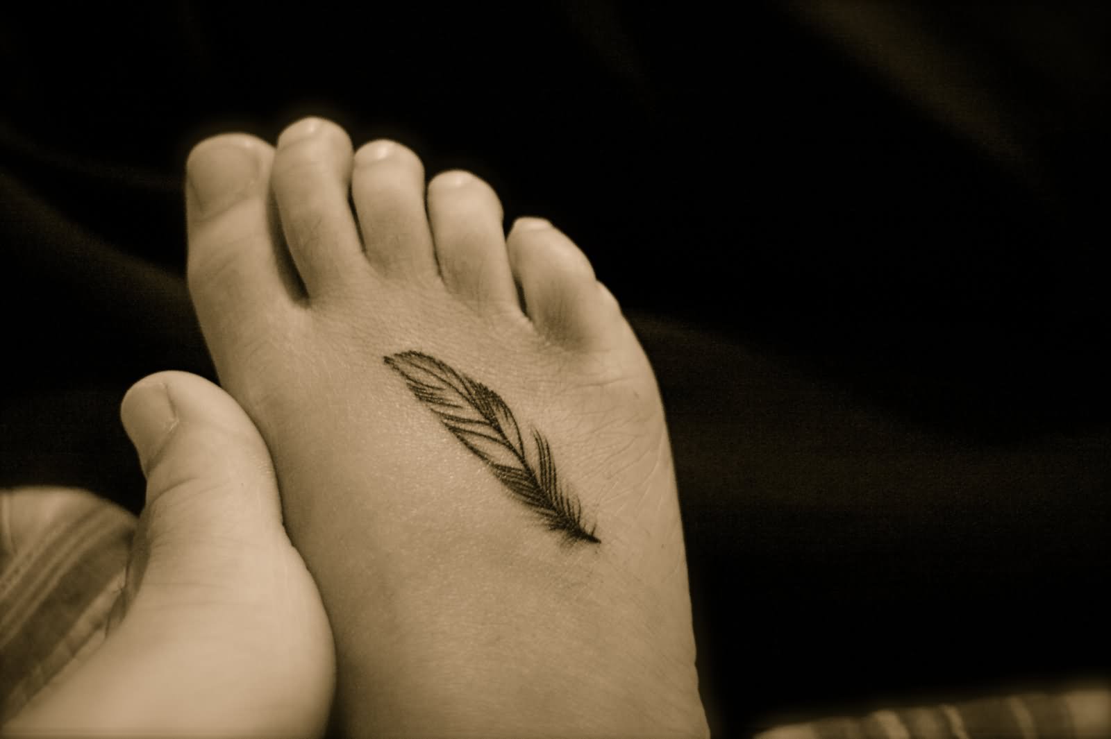 Cool Black And Grey Feather Tattoo On Right Foot