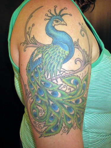 Cool Indian Peacock Tattoo On Women Right Half Sleeve