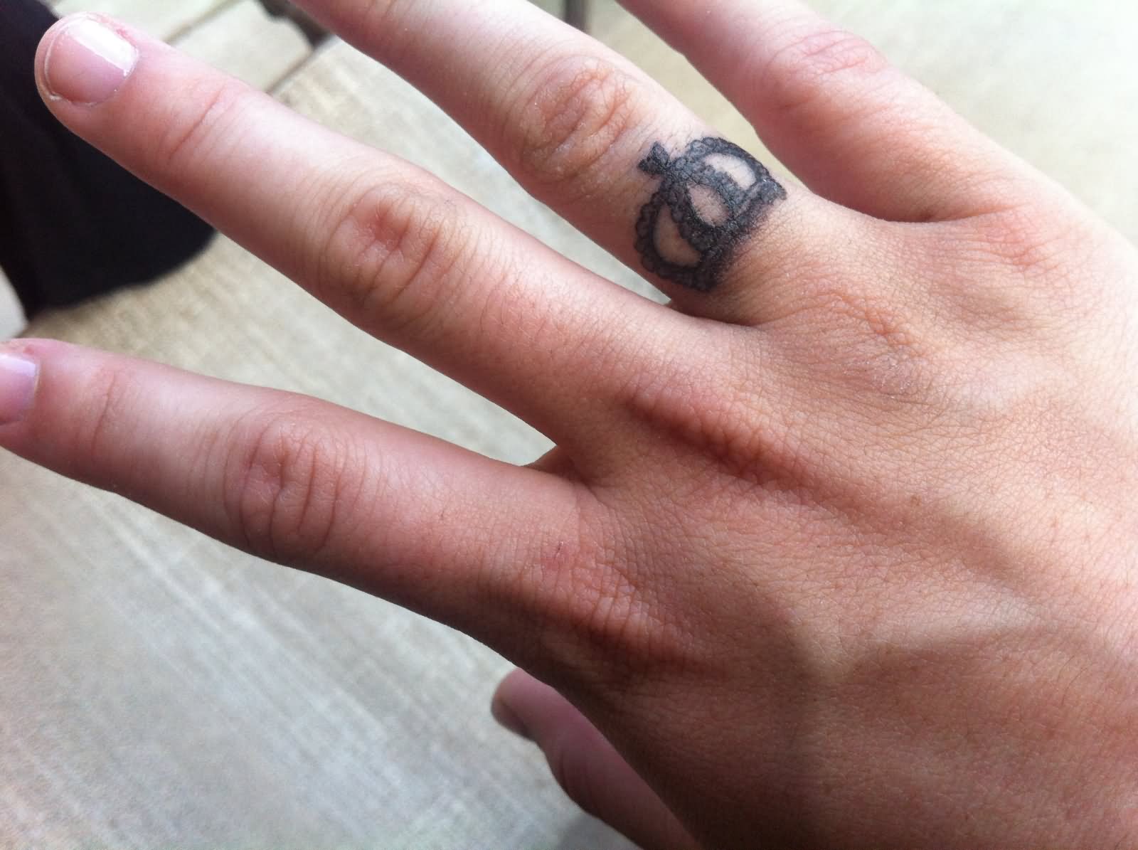 Crown Ring Tattoo On Finger
