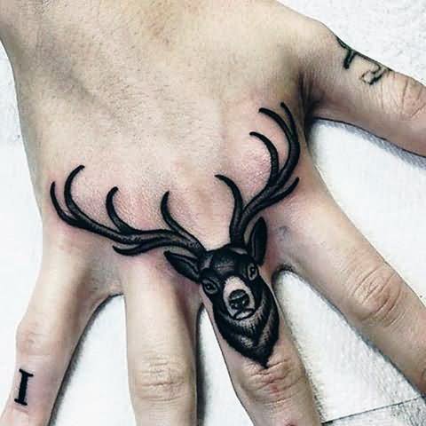 Deer Head Knuckles Tattoo On Finger