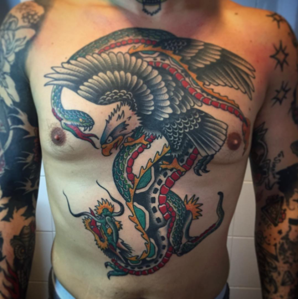 Eagle And Snake Tattoo On Man Chest