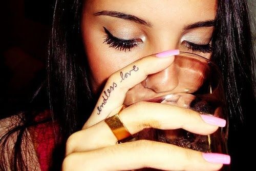 Endless Love Lettering Tattoo On Girl Side Finger