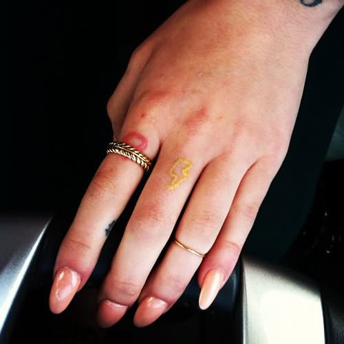 Energy Symbol Tattoo On Finger