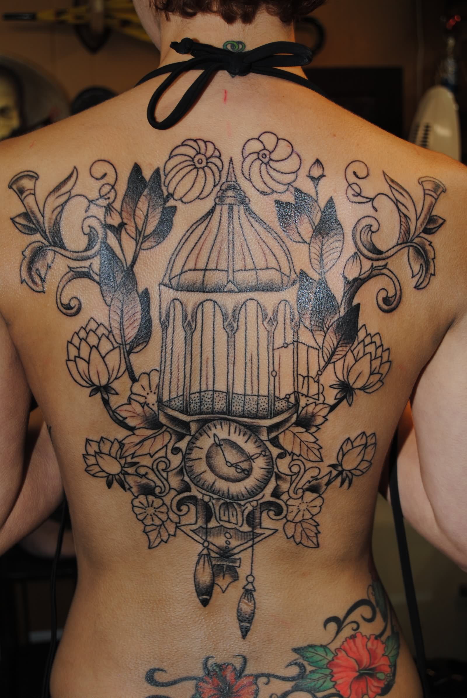 Flowers And Cage Tattoo On Full Back