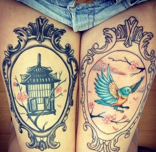Flying Bird And Cage In Frames Tattoo On Both Thigh