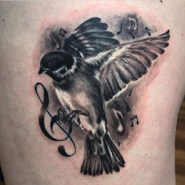 Flying Bird With Music Note Tattoo On Side Body