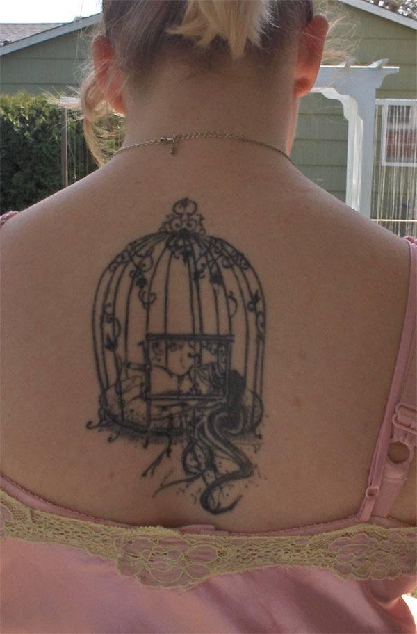 Girl Upper Back Cage Tattoo