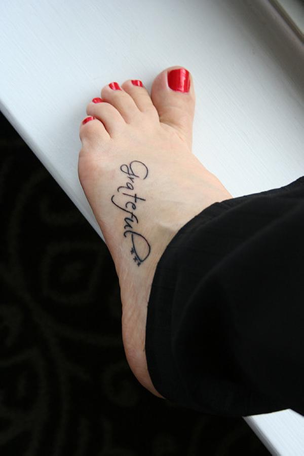 Grateful Lettering Tattoo On Left Foot