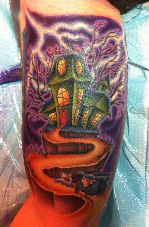 Green Haunted House Tattoo On Left Bicep