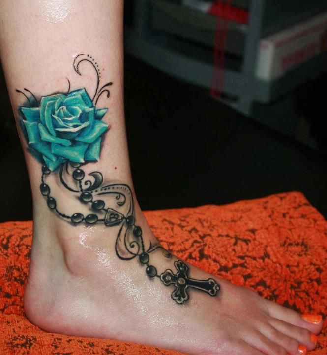 Green Ink Rose With Rosary Cross Tattoo On Girl Right Foot