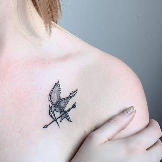 Grey Ink Bird With Arrow Tattoo Design For Collar Bone