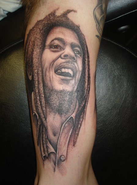 Grey Ink Bob Marley Tattoo On Left Sleeve