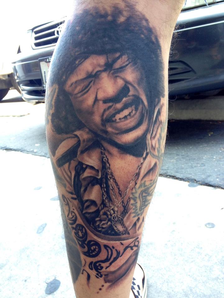 Grey Ink Bob Marley Tattoo On Leg