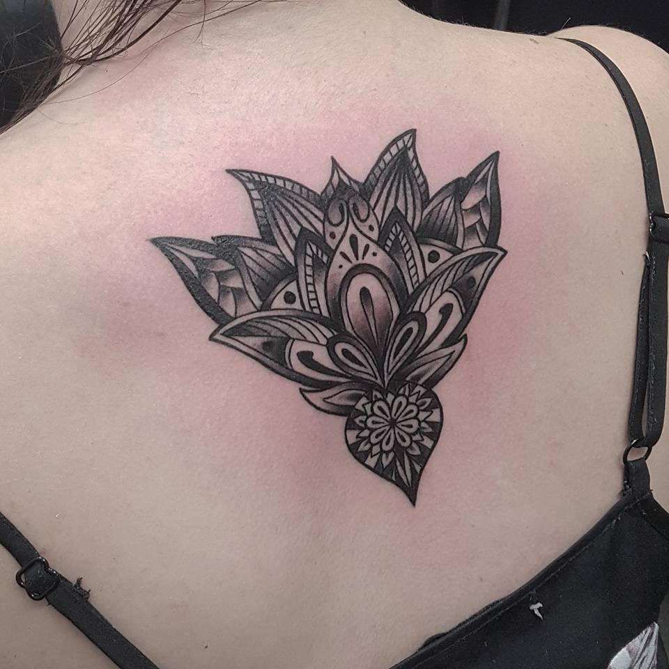 Grey Ink Custom Lotus Tattoo On Girl Upper Back by Jamie