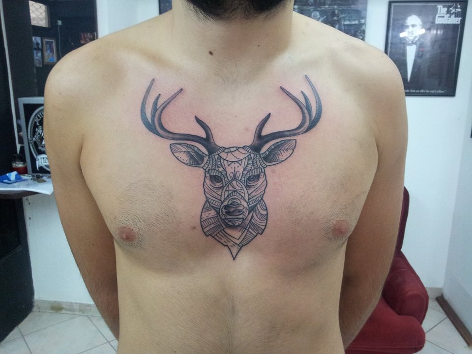 Grey Ink Deer Head Tattoo On Chest by Simon Painltdtattoo