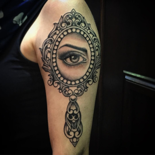 Grey Ink Eye In Hand Mirror Tattoo On Left Shoulder
