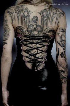 Grey Ink Gothic Skull Tattoo On Girl Upper Back