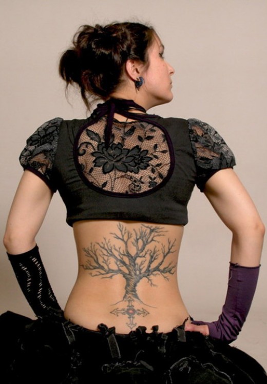 Grey Ink Gothic Tree Without Leaves Tattoo On Girl Lower Back