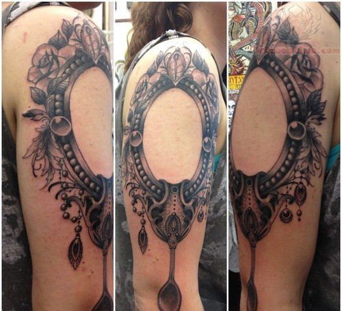 Grey Ink Hand Mirror Tattoo On Girl Right Shoulder