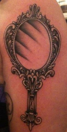Grey Ink Hand Mirror Tattoo On Left Shoulder