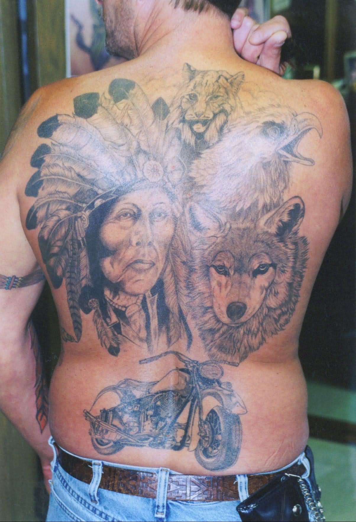 Grey Ink Indian Chief With Wolf Tattoo On Man Full Back