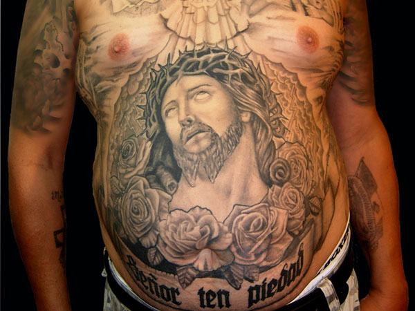 Grey Ink Jesus Face With Roses Tattoo On Man Stomach