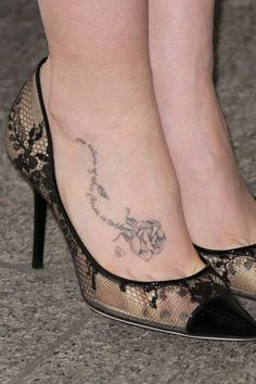 Grey Ink Little Rose Tattoo On Girl Right Foot