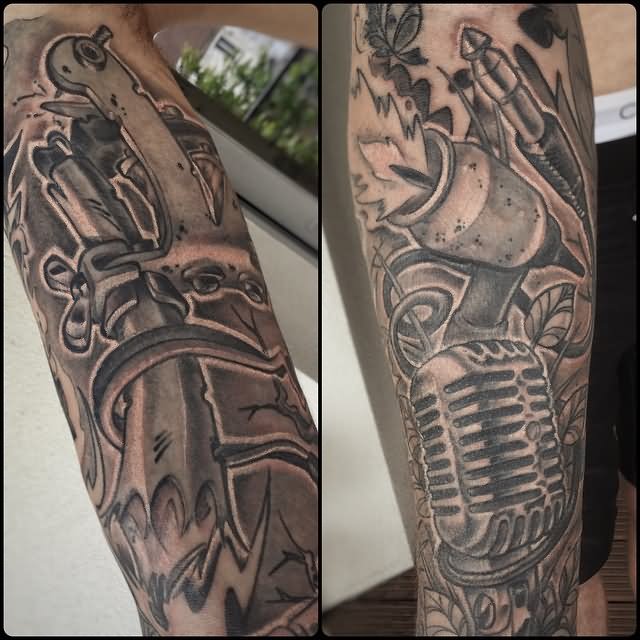 Grey Ink Microphone Tattoo On Sleeve