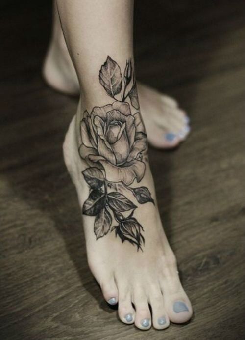 Grey Ink Rose Tattoo On Girl Right Foot
