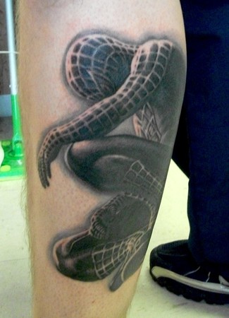 Grey Ink Spiderman Tattoo On Leg
