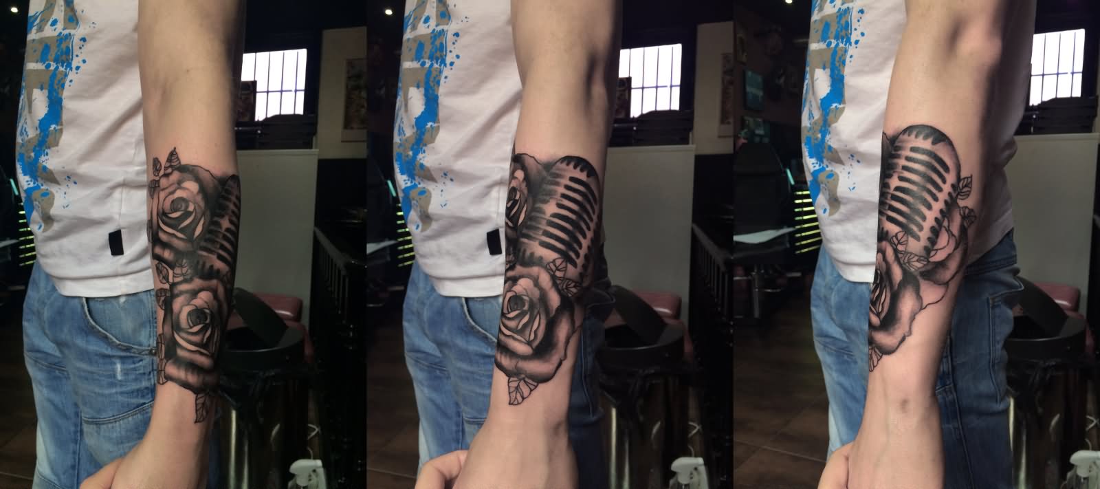 Grey Roses And Microphone Tattoo On Sleeve