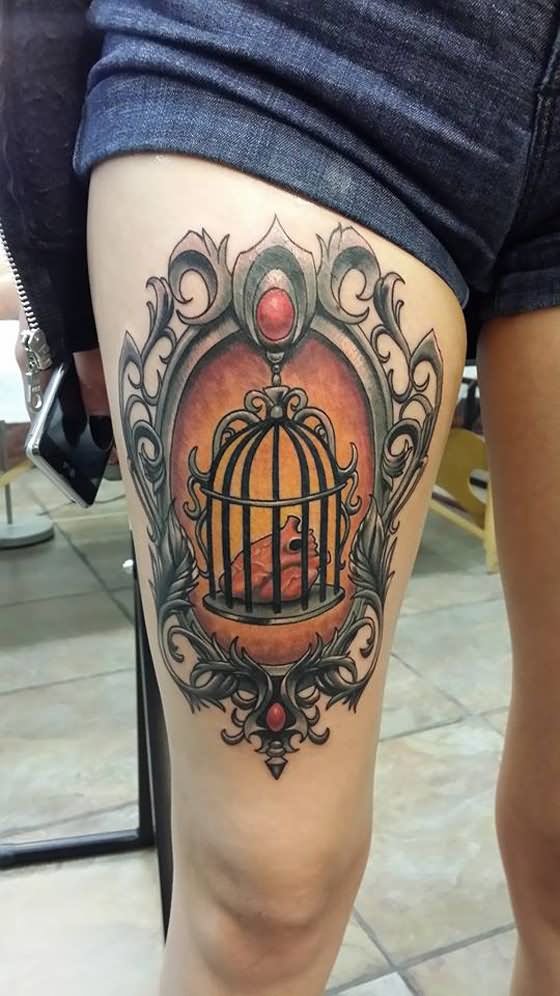 Heart In Cage Tattoo On Right Thigh