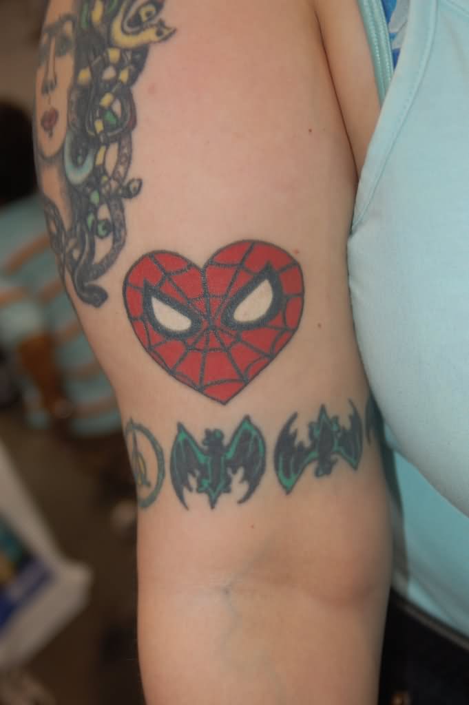Heart Spiderman Face Tattoo On Bicep