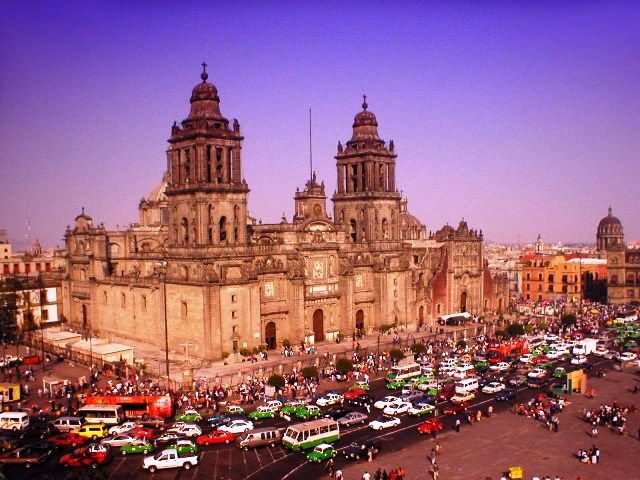 High Traffic In Front Of Metropolitan Cathedral In Mexico